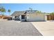Charming single-Gathering home featuring a gravel front yard and convenient two-car garage at 4521 W Buffalo St, Chandler, AZ 85226