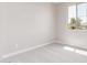 Bright bedroom with carpeted floors and natural light from the window at 5016 W Brown St, Glendale, AZ 85302