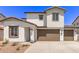 Charming two-story home with a two-car garage and desert landscaping at 5016 W Brown St, Glendale, AZ 85302