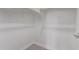 Cozy walk-in closet with carpeted floors and wooden clothes rod at 5016 W Brown St, Glendale, AZ 85302