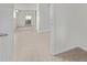Bright bedroom features neutral tile, mirrored closet doors, and white trim throughout at 5129 W Windrose Dr, Glendale, AZ 85304