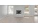 Bright living room with fireplace, large windows and tile floors at 5129 W Windrose Dr, Glendale, AZ 85304