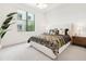 Comfortable bedroom with natural light, stylish decor, and plush bedding for a serene retreat at 5250 E Deer Valley Dr # 440, Phoenix, AZ 85054