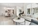 Open-concept living space with a view of the modern kitchen and dining area at 5250 E Deer Valley Dr # 440, Phoenix, AZ 85054