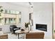 Inviting living room featuring a modern fireplace, stylish furniture, and ample natural light at 5250 E Deer Valley Dr # 440, Phoenix, AZ 85054