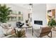 Bright living room with modern fireplace and large window offering city views at 5250 E Deer Valley Dr # 440, Phoenix, AZ 85054