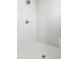 Modern walk-in shower with sleek fixtures and decorative vertical tile accent at 5250 E Deer Valley Dr # 440, Phoenix, AZ 85054