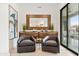 Sitting room with wood accent furniture and a view to an outside patio at 5250 E Deer Valley Dr # 440, Phoenix, AZ 85054