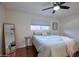 Cozy bedroom featuring terra-cotta flooring, and a ceiling fan at 5550 N 12Th St # 2, Phoenix, AZ 85014