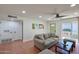 Relaxing living area with recessed lighting, comfortable seating, and easy outdoor access at 5550 N 12Th St # 2, Phoenix, AZ 85014