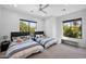 Inviting bedroom featuring two beds, ample natural light, and neutral decor at 6321 N Camelback Manor Dr, Paradise Valley, AZ 85253