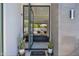 Welcoming entryway into an open floorplan to a living space and access to a backyard pool at 6321 N Camelback Manor Dr, Paradise Valley, AZ 85253