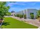 Contemporary home exterior with vibrant landscaping, modern architectural style and desert charm at 6321 N Camelback Manor Dr, Paradise Valley, AZ 85253