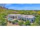 Aerial view showcasing the modern architecture, backyard pool, and meticulously landscaped grounds at 6321 N Camelback Manor Dr, Paradise Valley, AZ 85253