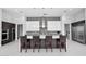 Modern kitchen with large island, barstool seating, stainless steel appliances and custom cabinetry at 6321 N Camelback Manor Dr, Paradise Valley, AZ 85253