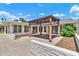 Spacious back patio with a stylish pergola, perfect for outdoor entertaining and relaxation at 737 E 7Th Pl, Mesa, AZ 85203
