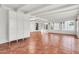 Spacious living space with tile floors, white walls, large storage cabinet, and natural light at 737 E 7Th Pl, Mesa, AZ 85203