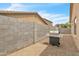 Spacious backyard with low-maintenance landscaping and privacy wall is perfect for outdoor activities and relaxation at 900 W Broadway Ave # 45, Apache Junction, AZ 85120
