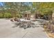 Community area with picnic tables and benches, perfect for outdoor gatherings and enjoying the surrounding green space at 900 W Broadway Ave # 45, Apache Junction, AZ 85120