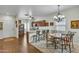 The dining room features an ornate chandelier and seating for four at 900 W Broadway Ave # 45, Apache Junction, AZ 85120