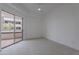 Bright bedroom boasts a ceiling fan and access to a private patio area at 945 E Playa Del Norte Dr # 3002, Tempe, AZ 85288