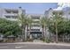 Modern condo exterior showcasing lush landscaping, sleek architecture, and a welcoming entrance at 945 E Playa Del Norte Dr # 3002, Tempe, AZ 85288