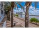 Pathway along Tempe Town Lake with sidewalk and view of modern buildings in the distance on a sunny day at 945 E Playa Del Norte Dr # 3002, Tempe, AZ 85288