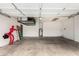 Spacious garage with high ceilings, organized storage, and ample room for vehicles and projects at 102 S Honeysuckle Ln, Gilbert, AZ 85296
