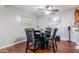Cozy dining area featuring a modern table set and decorative wall art at 10472 W Devonshire Ave, Phoenix, AZ 85037