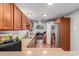 The kitchen features stainless steel appliances, granite countertops, and a range hood at 10472 W Devonshire Ave, Phoenix, AZ 85037
