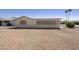 Low maintenance gravel backyard with plenty of space to add your personal touch at 1134 S 79Th Pl, Mesa, AZ 85208