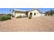 Well-maintained home featuring desert landscaping and a welcoming front entrance at 1134 S 79Th Pl, Mesa, AZ 85208