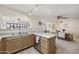 Functional kitchen area with a view into the dining room, showcasing practical design at 1134 S 79Th Pl, Mesa, AZ 85208