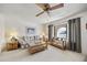 Comfortable living room with carpet, ceiling fan and natural light at 1134 S 79Th Pl, Mesa, AZ 85208
