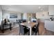 Spacious living room flows into the dining area and a view of the kitchen at 1179 N 13Th St, Coolidge, AZ 85128