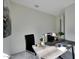 Bright home office featuring a modern desk and chair setup, artwork, and a quiet, productive work environment at 1179 N 13Th St, Coolidge, AZ 85128