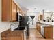 Traditional kitchen featuring oak cabinets, stainless steel appliances, and granite counter tops at 13171 W Redfield Rd, Surprise, AZ 85379