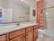 Well-lit bathroom featuring a vanity with a sink and a shower with a curtain at 15216 W Westview Dr, Goodyear, AZ 85395