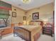 Charming bedroom with airplane-themed decor, a comfortable bed, and a bright window at 15216 W Westview Dr, Goodyear, AZ 85395