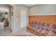Bedroom with a futon and glimpses of the dining area offering a adaptable space at 15216 W Westview Dr, Goodyear, AZ 85395