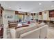 Spacious living room with elegant furnishings, natural light, and open floor plan for easy entertaining at 15216 W Westview Dr, Goodyear, AZ 85395