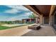 View of the outdoor grilling area and pool from the edge of the covered patio at 15217 N 15Th Dr, Phoenix, AZ 85023