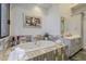 Bright bathroom features a soaking tub with gray tile and double vanity at 15217 N 15Th Dr, Phoenix, AZ 85023