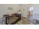 The Bedroom features a cute crib, dresser and decor, with soft lighting and a calming atmosphere at 15217 N 15Th Dr, Phoenix, AZ 85023