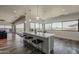Bright kitchen area with counter seating, lots of natural light, and expansive window views at 15217 N 15Th Dr, Phoenix, AZ 85023