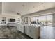 A bright modern kitchen featuring a large island with seating for four at 15217 N 15Th Dr, Phoenix, AZ 85023