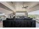 Living room featuring a large sectional sofa, entertainment center, and scenic neighborhood views at 15217 N 15Th Dr, Phoenix, AZ 85023