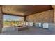 Outdoor kitchen featuring stainless steel appliances, countertops, and a stone fire pit at 15217 N 15Th Dr, Phoenix, AZ 85023