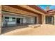 An open patio and brick fire pit with a view to the open floorplan at 15217 N 15Th Dr, Phoenix, AZ 85023