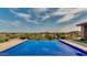 Inviting pool featuring an infinity edge with amazing, unobstructed views of the city and mountains beyond at 15217 N 15Th Dr, Phoenix, AZ 85023